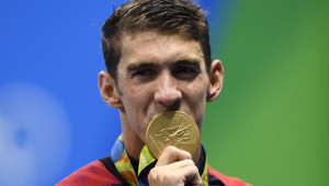 201608101249549353_Rio-2016-Michael-Phelps-extends-his-tally-to-21-Olympic_SECVPF